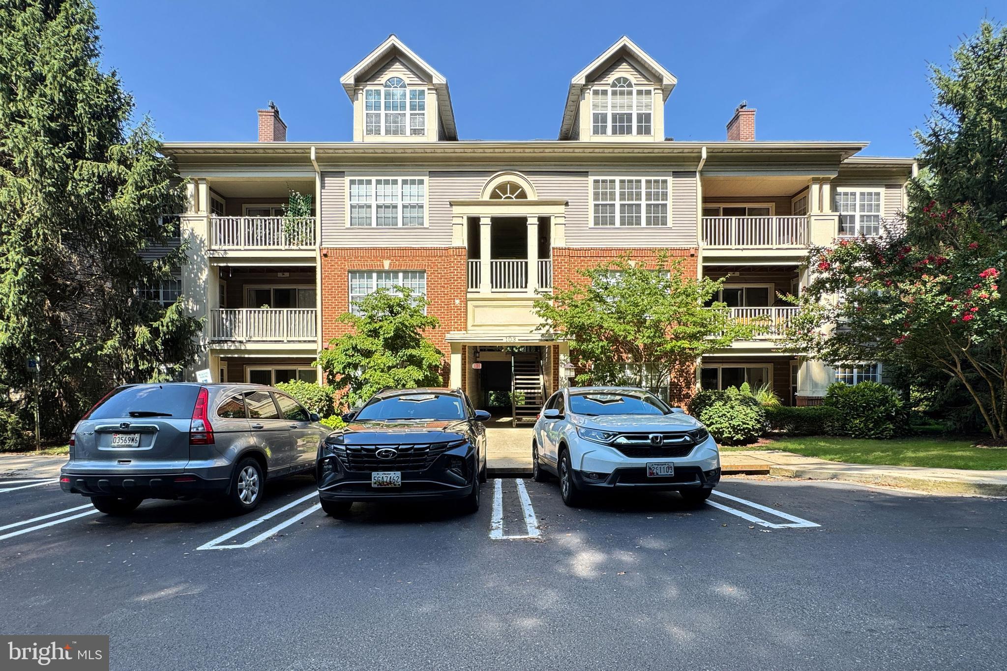 a car parked in front of a house