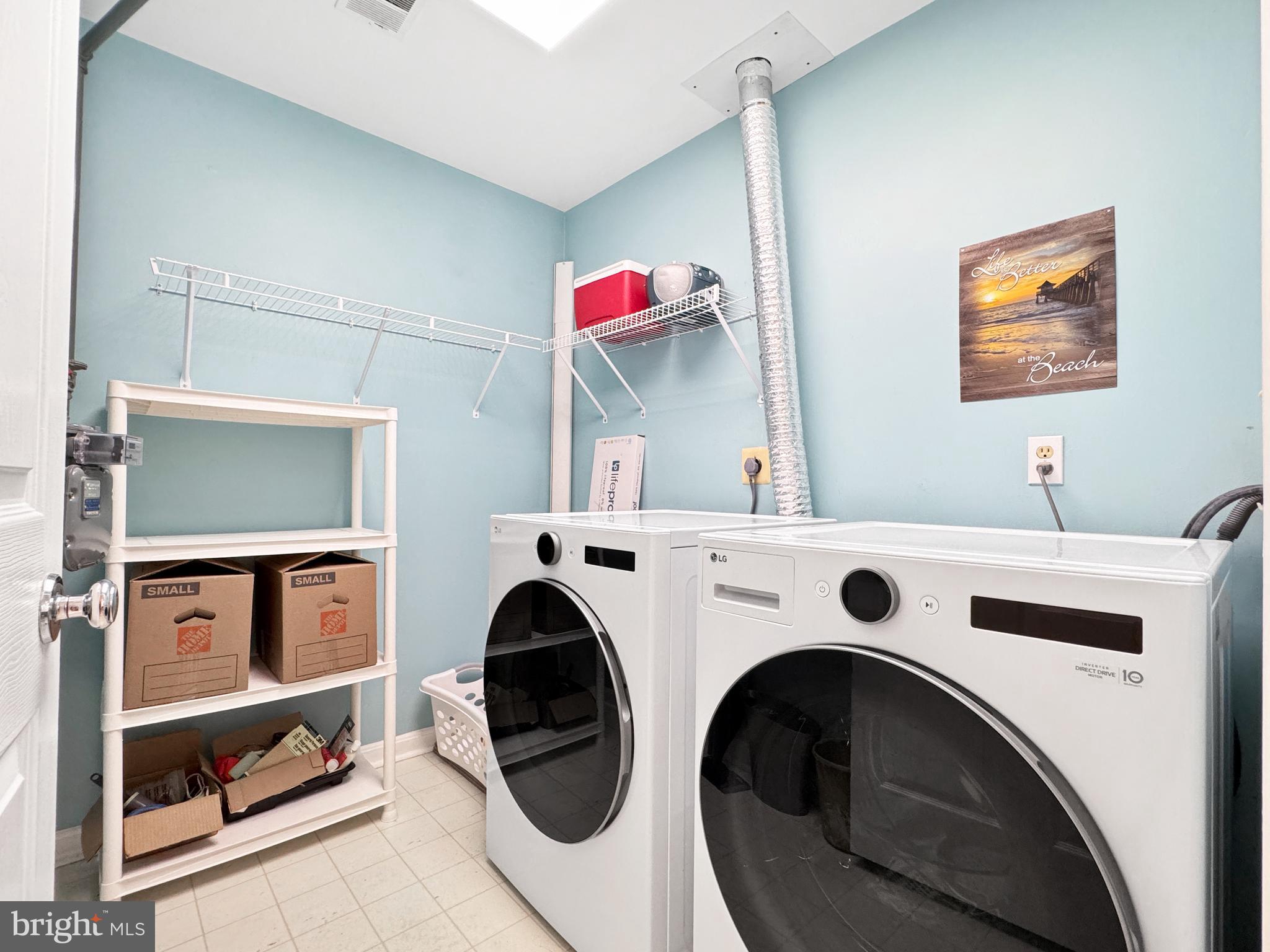 103 Timberbrook Lane, Unit 104 Gaithersburg, MD 20878 - Photo 14 of 35 a view of livingroom with washer and dryer