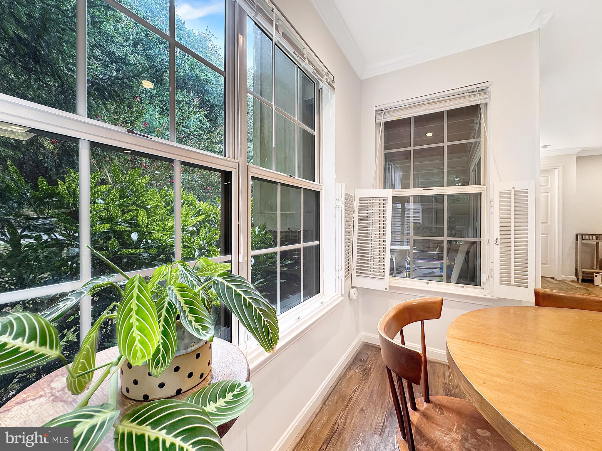 103 Timberbrook Lane, Unit 104 Gaithersburg, MD 20878 - Photo 23 of 35 a view of a two chair in the balcony