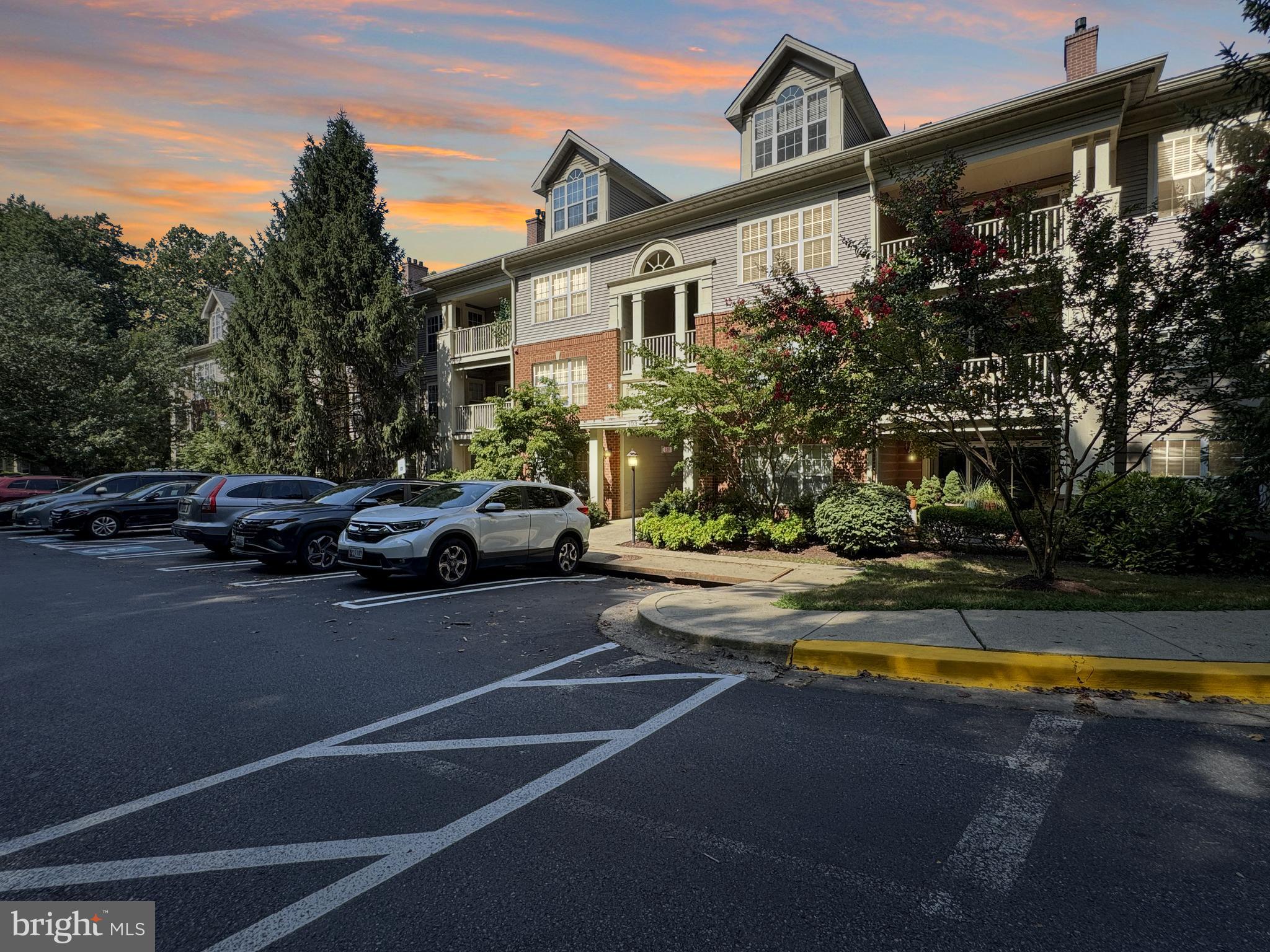 103 Timberbrook Lane, Unit 104 Gaithersburg, MD 20878 - Photo 28 of 35 a view of a street with cars on road