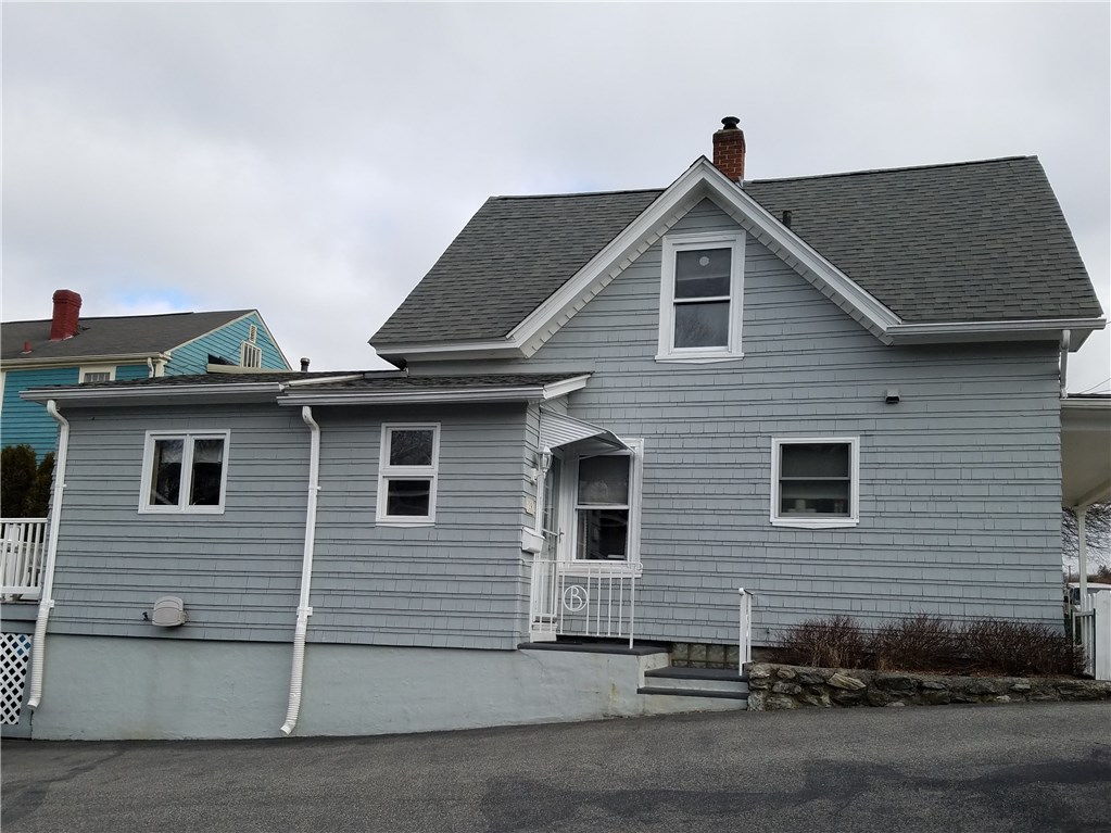 28 Yolande Place Woonsocket, RI 02895 - Photo 3 of 31 Large driveway for parking. Side entrance of home has a lovely mud room for entrance.
