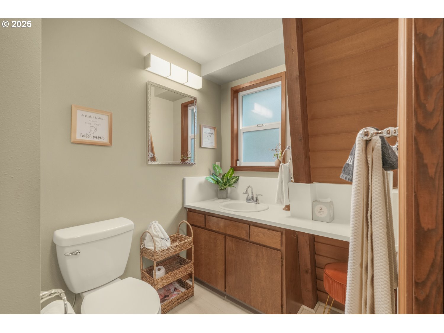 21760 East Tree Swallow Lane Rhododendron, OR 97049 - Photo 26 of 32 a bathroom with a sink toilet and mirror