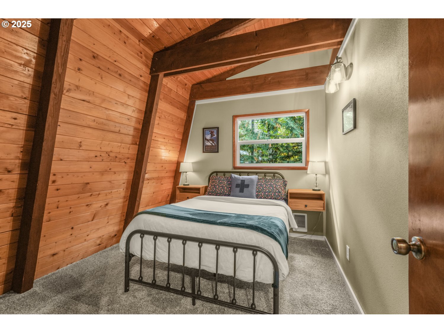 21760 East Tree Swallow Lane Rhododendron, OR 97049 - Photo 29 of 32 a bedroom with a bed and a window