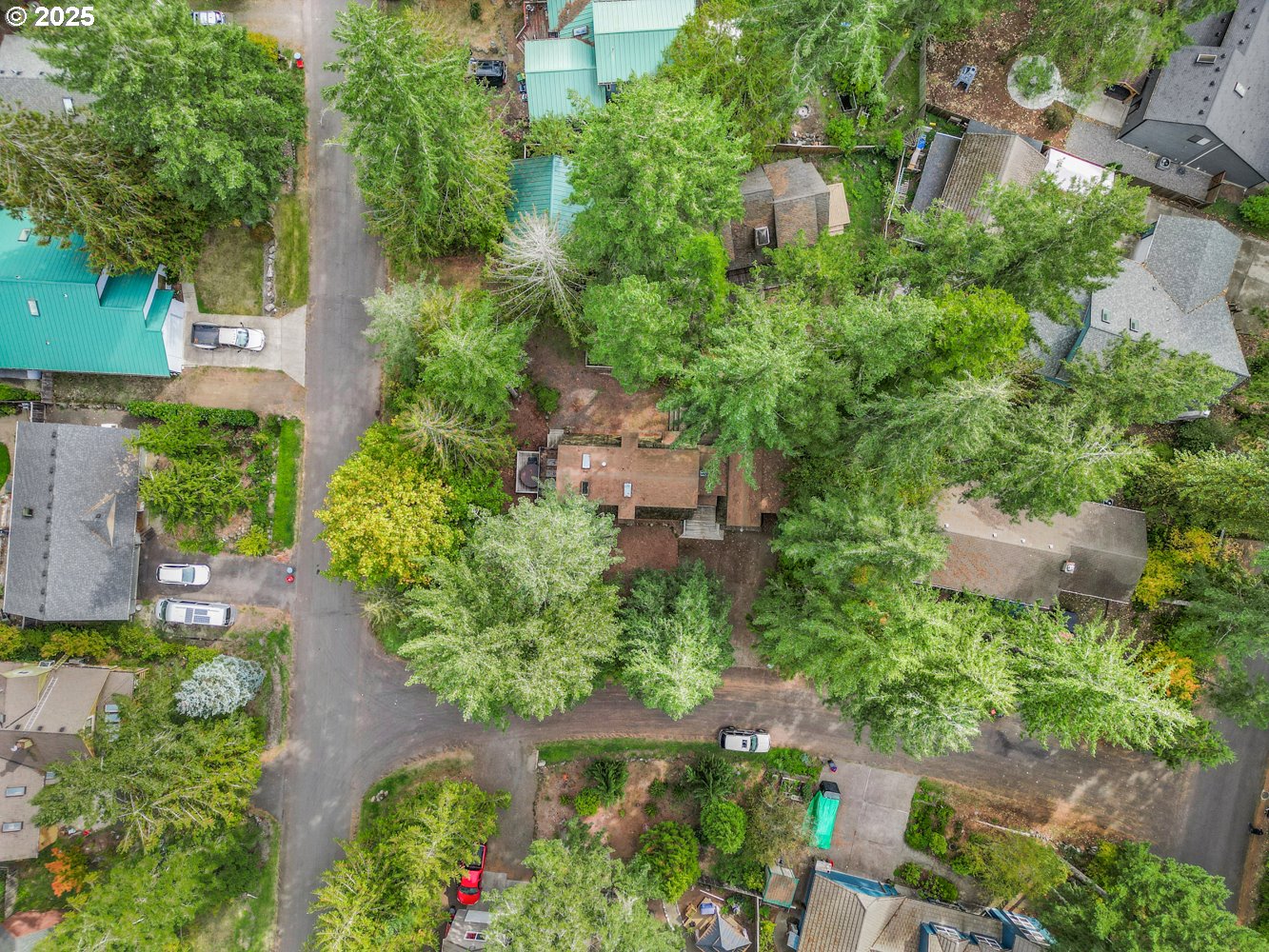 21760 East Tree Swallow Lane Rhododendron, OR 97049 - Photo 31 of 32 an aerial view of a house with a yard and lake view