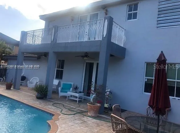 a room with furniture a desk and chair