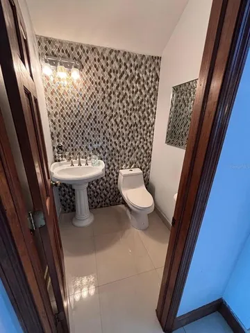 a bathroom with a toilet