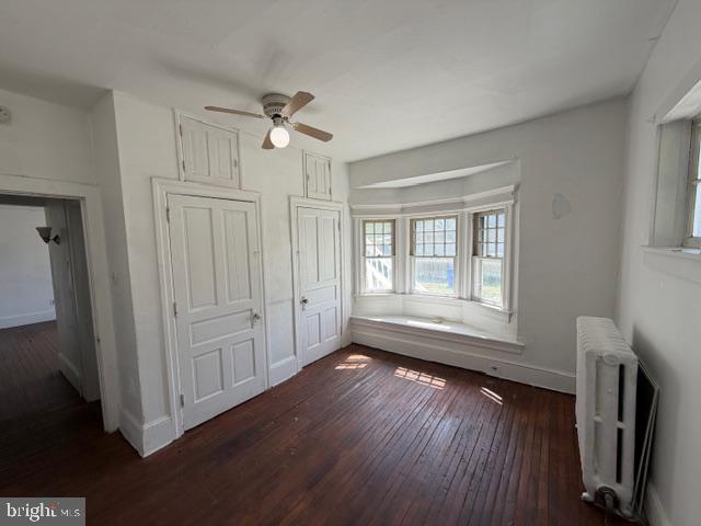 718 Woodlane Road Beverly, NJ 08010 - Photo 14 of 22 a view of empty room with wooden floor and fan