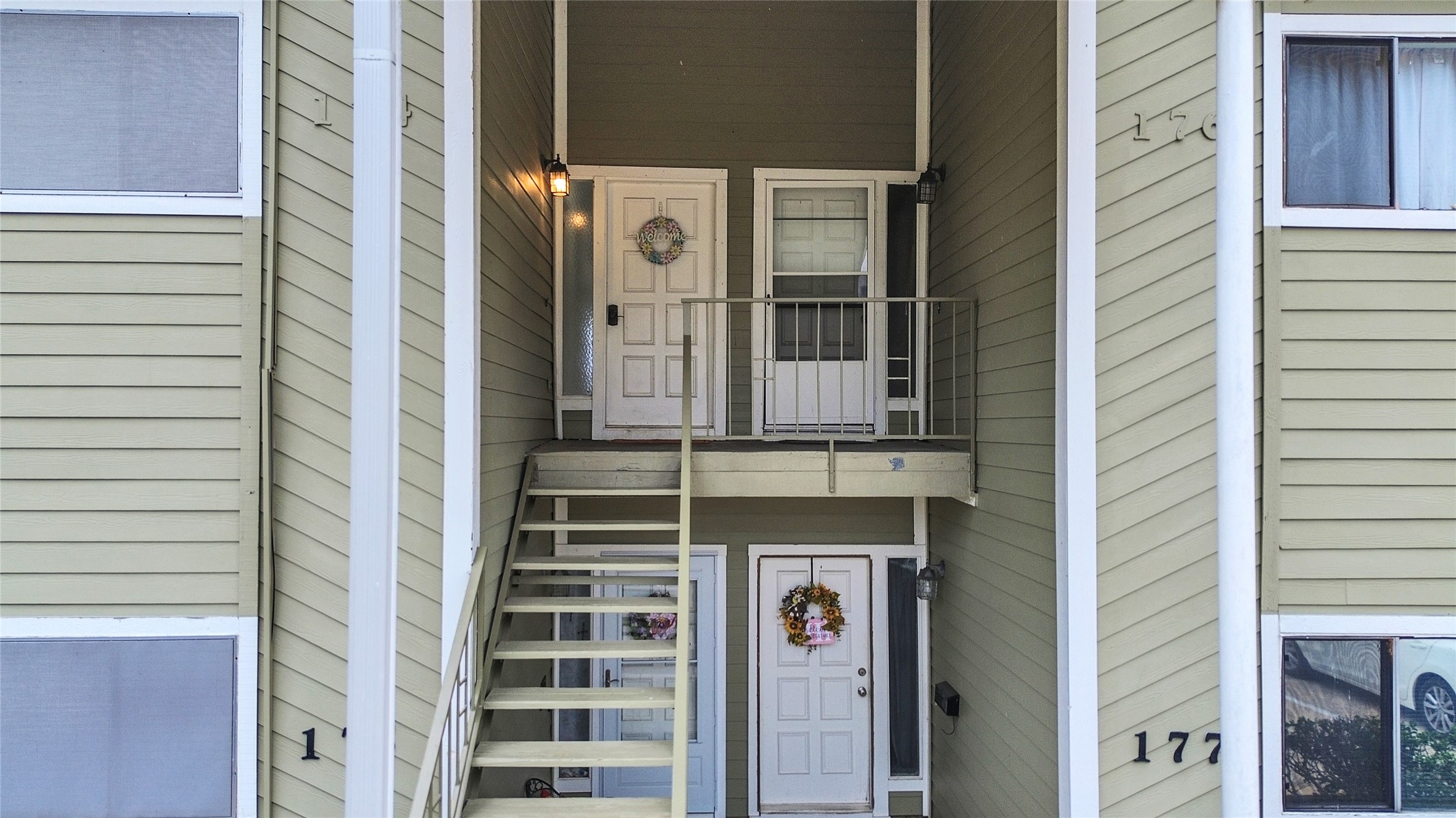 174 April Point Drive South Conroe, TX 77356 - Photo 11 of 38 a front view of a building with a door