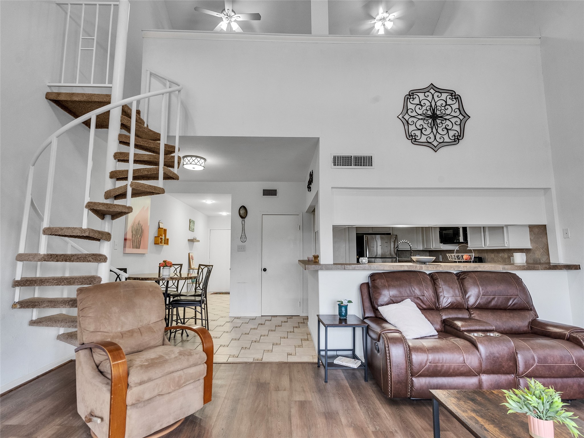 174 April Point Drive South Conroe, TX 77356 - Photo 26 of 38 a living room with furniture and a wooden floor