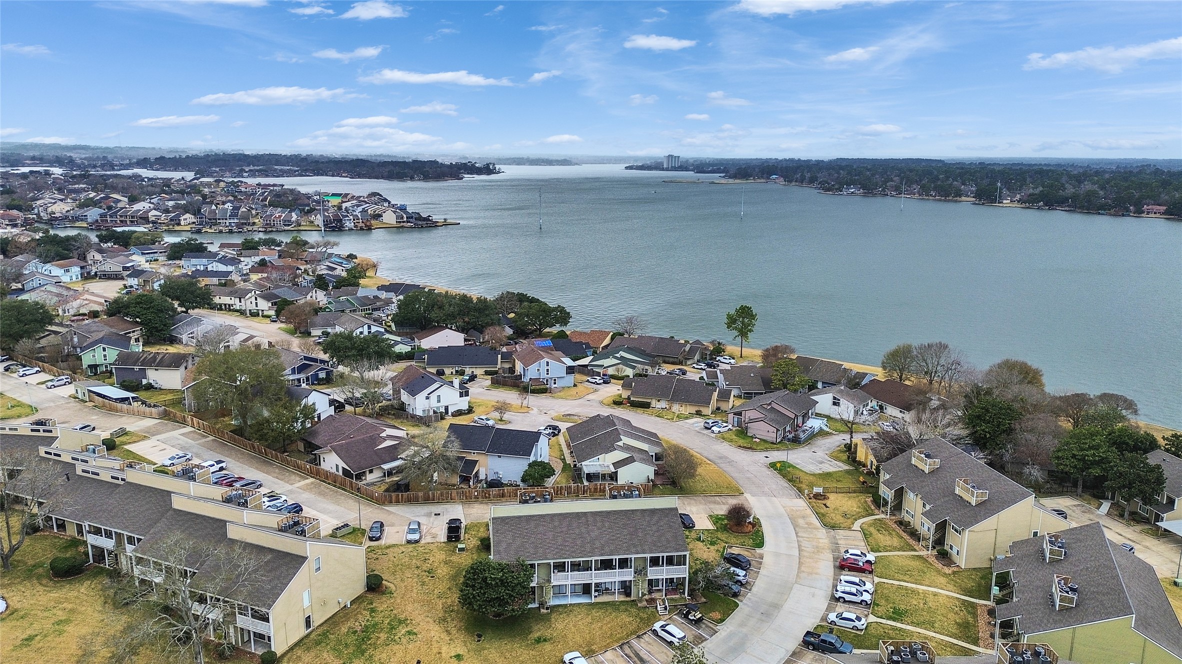 174 April Point Drive South Conroe, TX 77356 - Photo 5 of 38 a view of a lake with a city