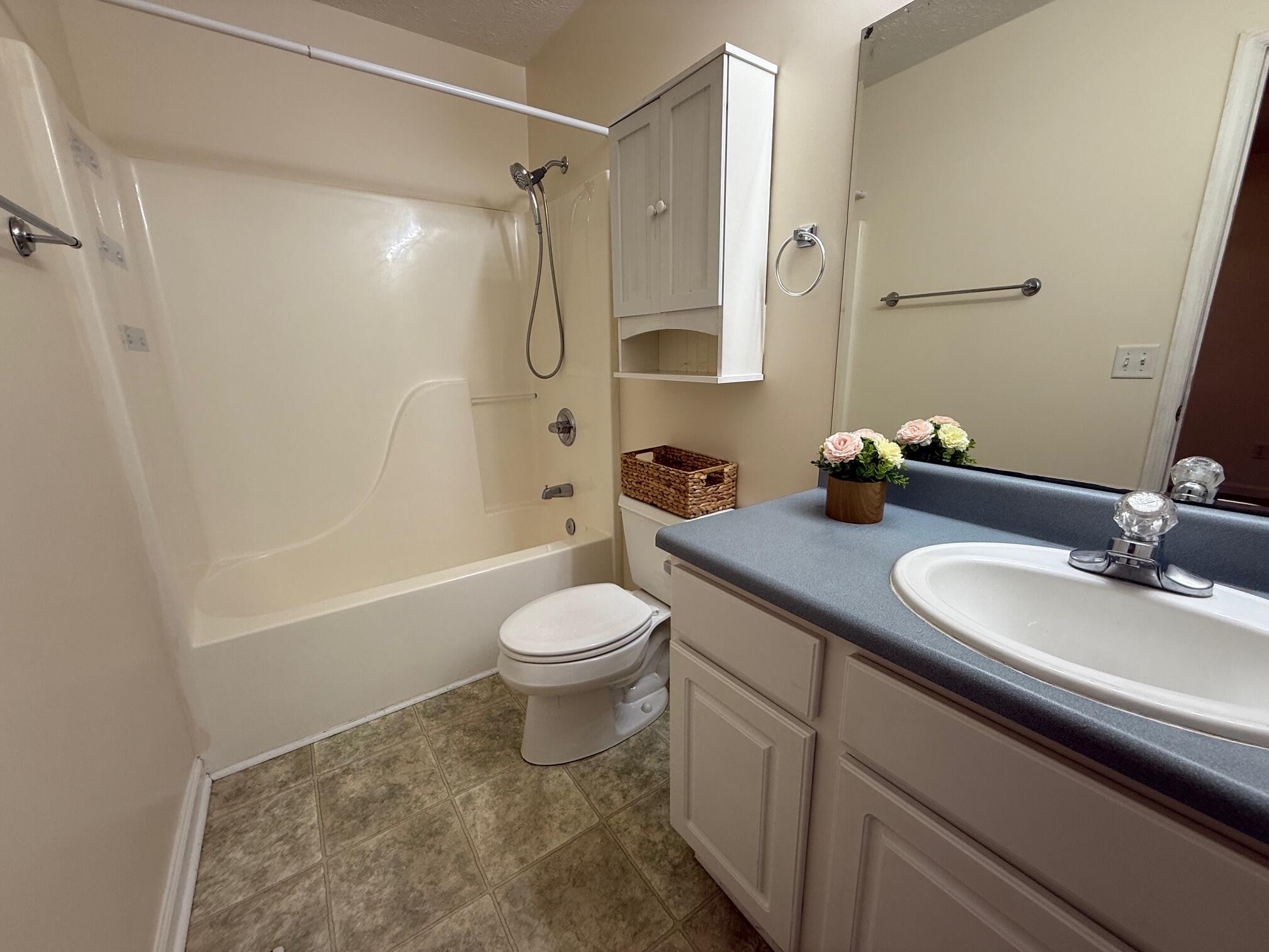 322 Signal Drive Rossville, GA 30741 - Photo 11 of 17 a bathroom with a sink a toilet and a bathtub
