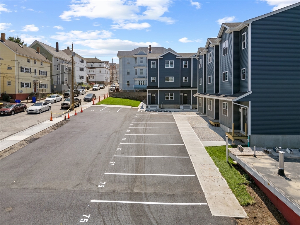 81 Hunter Street Fall River, MA 02721 - Photo 6 of 15 a view of a city with tall buildings