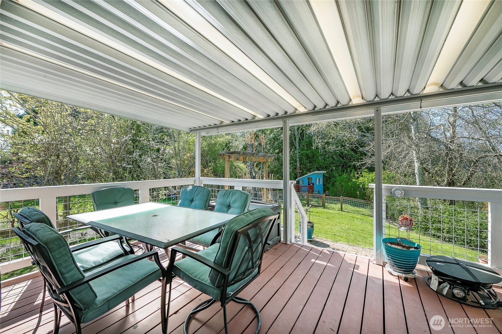 8209 Comox Road Birch Bay, WA 98230 - Photo 14 of 24 a view of a dining room with furniture window and wooden floor