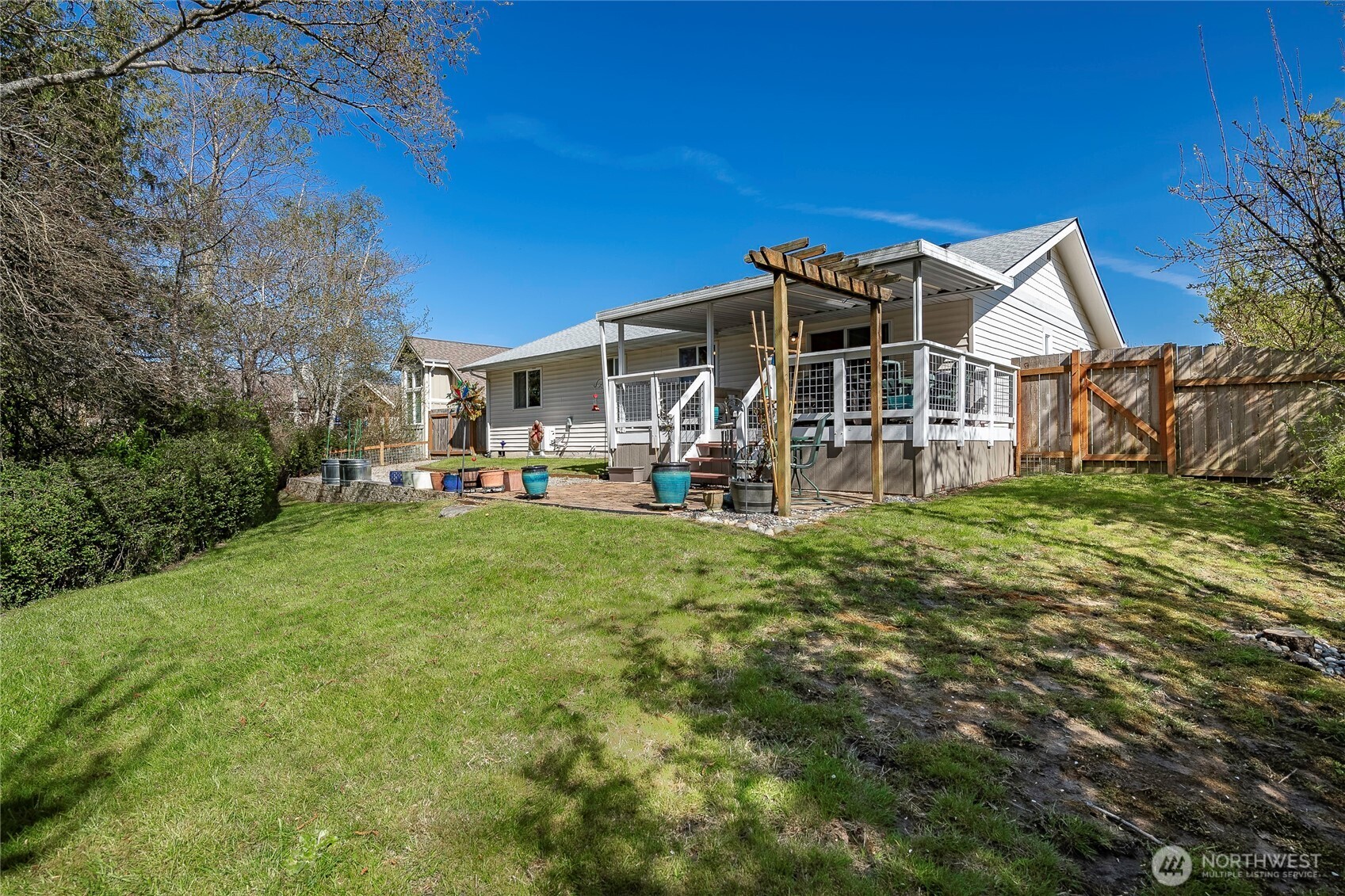 8209 Comox Road Birch Bay, WA 98230 - Photo 16 of 24 a front view of a house with garden