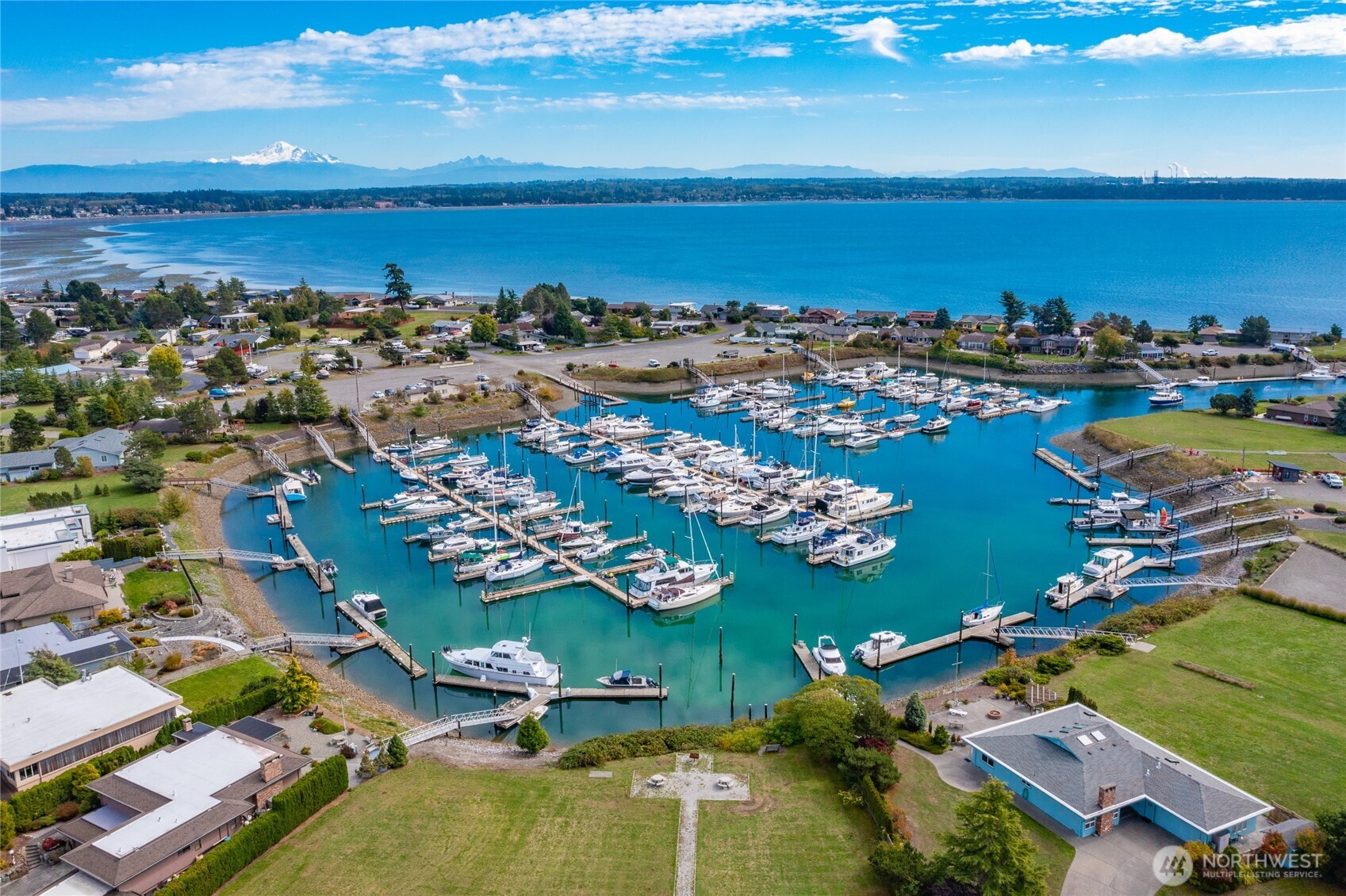 8209 Comox Road Birch Bay, WA 98230 - Photo 20 of 24 an aerial view of a city with lots of residential buildings ocean and mountain view in back