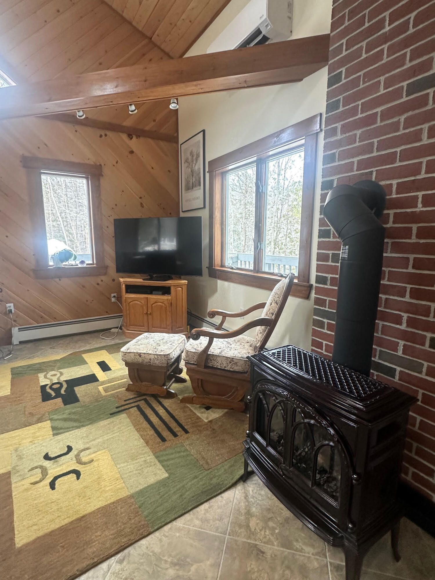 74 Garland Road Dixmont, ME 04932 - Photo 12 of 39 Great Room propane heat stove