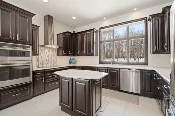 $859,900 | 945 Woodcrest Heights Drive, Menasha, WI 54952