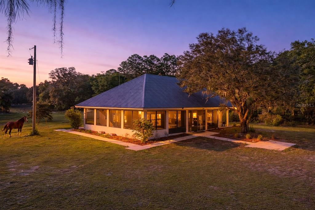 1045 Buckles Road Pierson, FL 32180 - Photo 17 of 19 a front view of a house with a yard