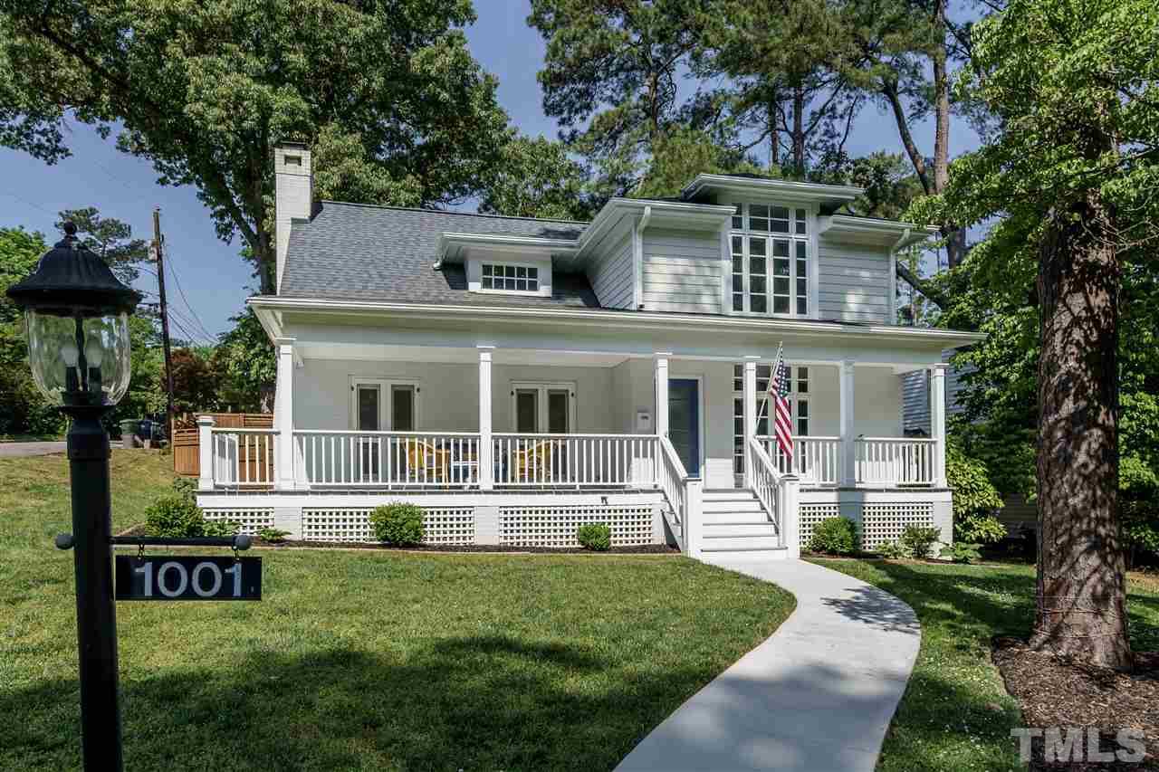 1001 Canterbury Road Raleigh, NC 27607 - Photo 1 of 29 front view of a house with a yard