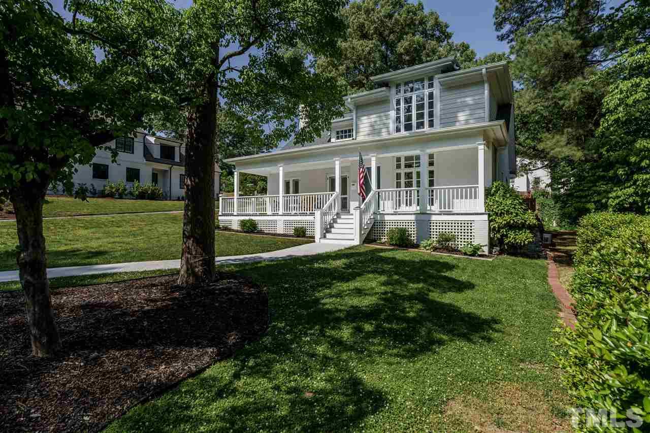 1001 Canterbury Road Raleigh, NC 27607 - Photo 3 of 29 a front view of house with yard and green space