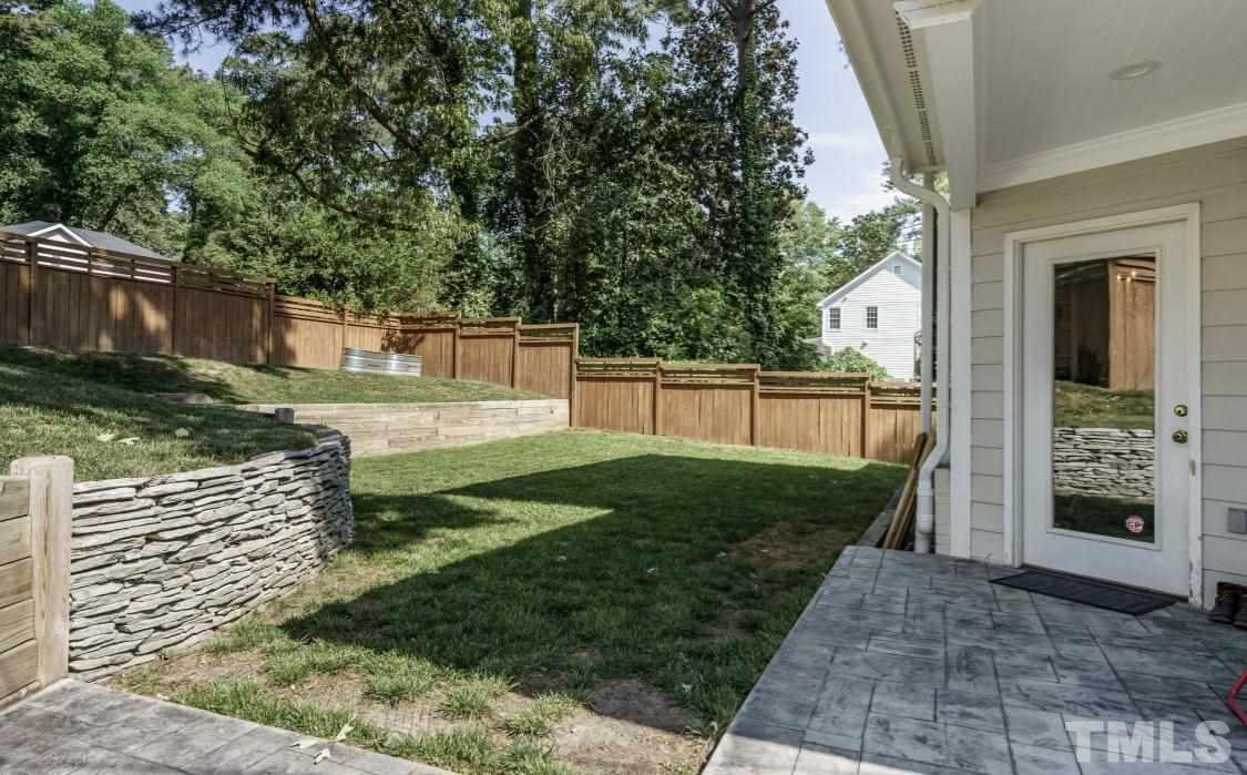 1001 Canterbury Road Raleigh, NC 27607 - Photo 25 of 29 a view of a backyard with pathway