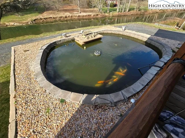 a view of a swimming pool from a balcony