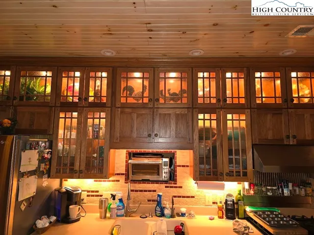 a lobby with furniture and floor to ceiling window