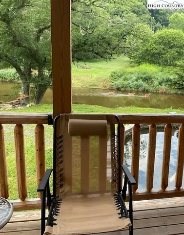 a view of a lake from a balcony