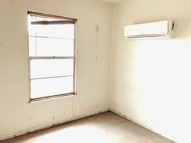 a view of a small space with a door