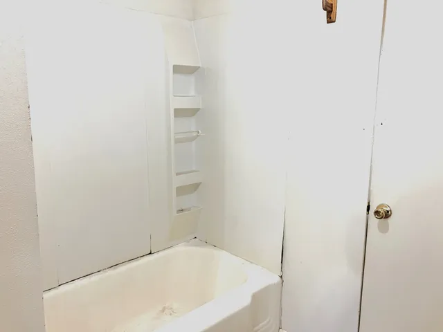 a bathroom with a bathtub
