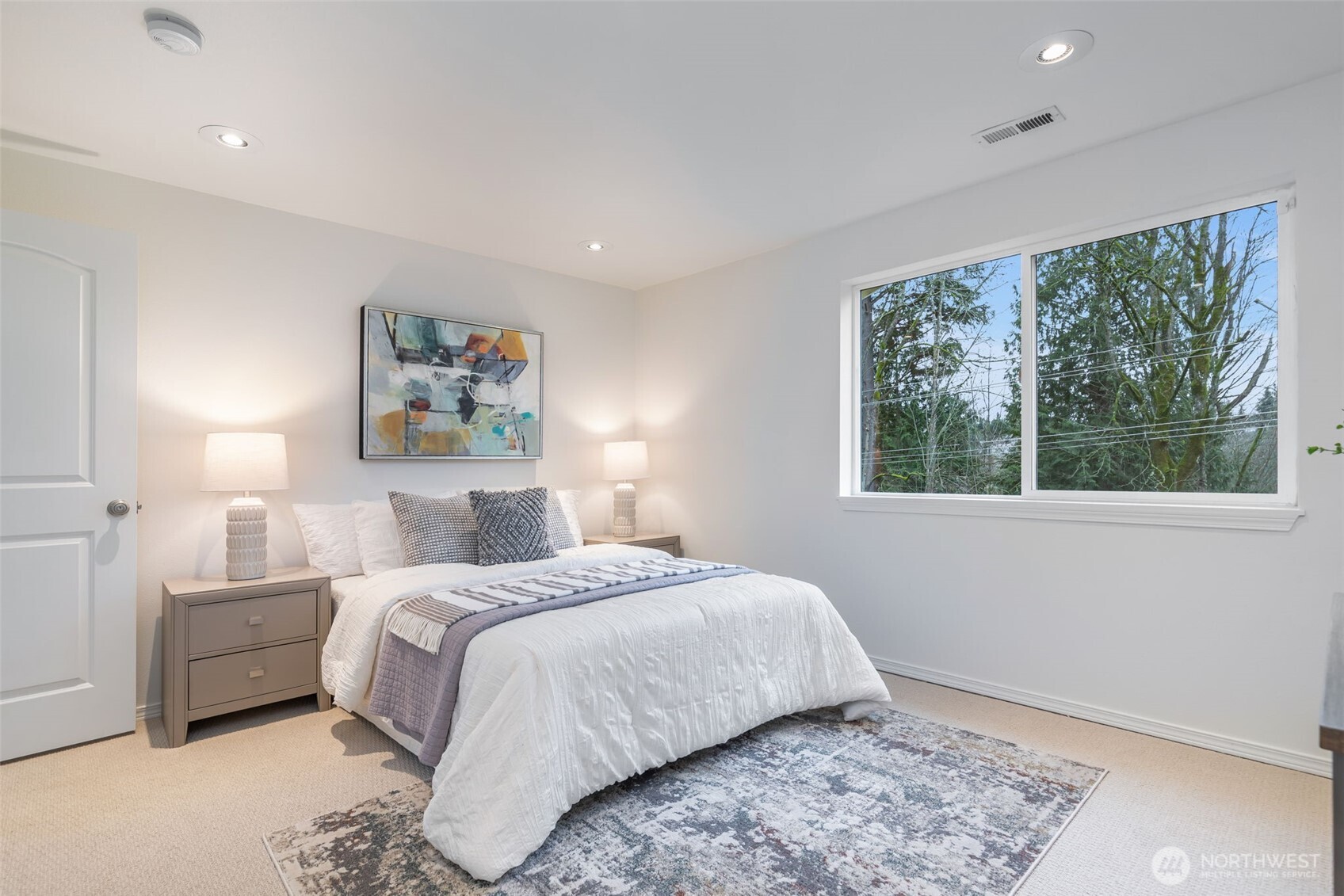 6107 South Fountain Street Seattle, WA 98178 - Photo 13 of 29 a bedroom with a large bed and a window