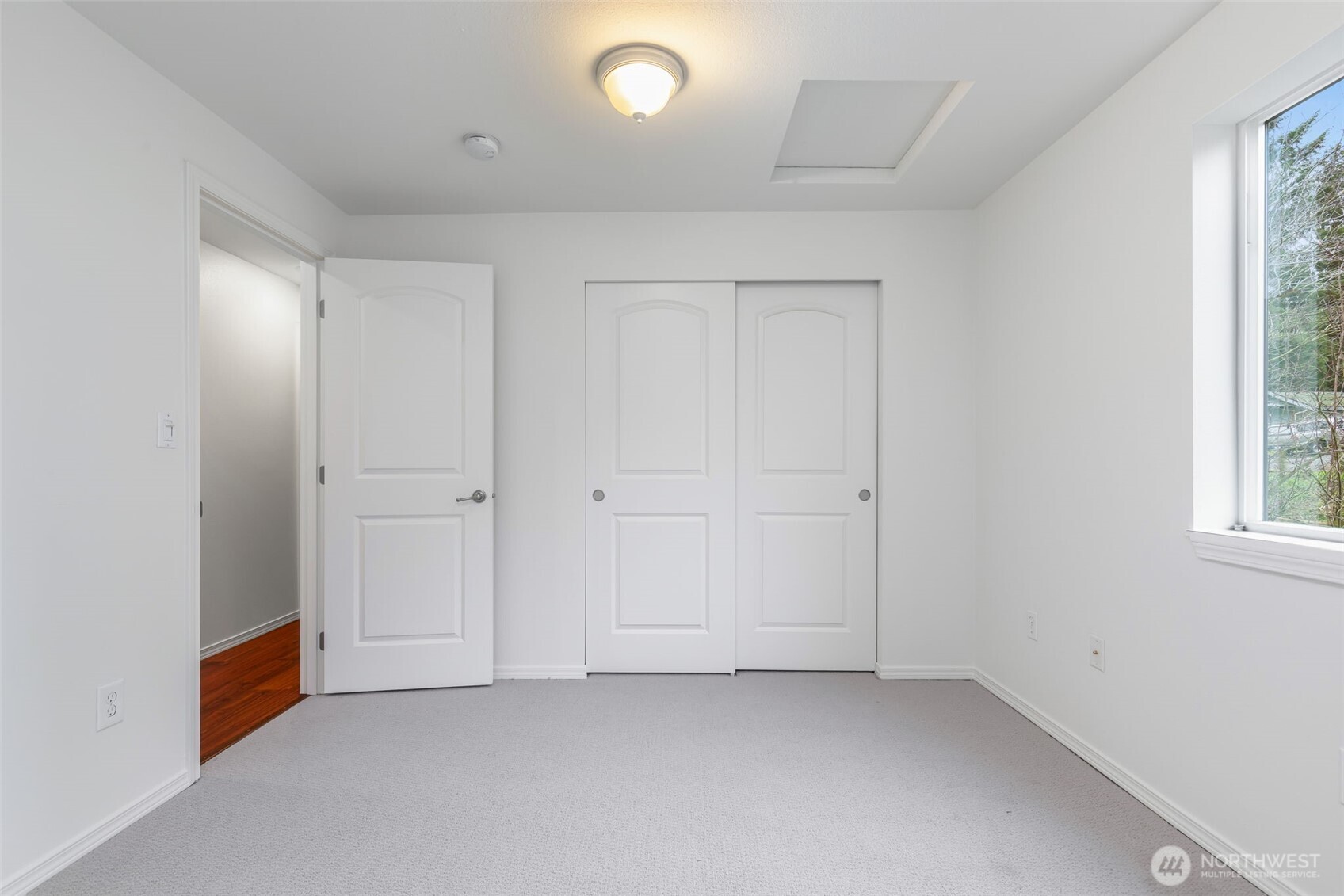 6107 South Fountain Street Seattle, WA 98178 - Photo 20 of 29 an empty room with windows