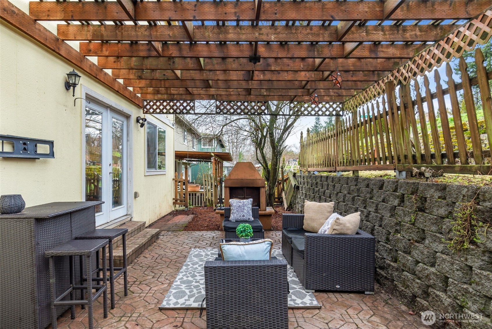 6107 South Fountain Street Seattle, WA 98178 - Photo 26 of 29 a living room with furniture and a fireplace