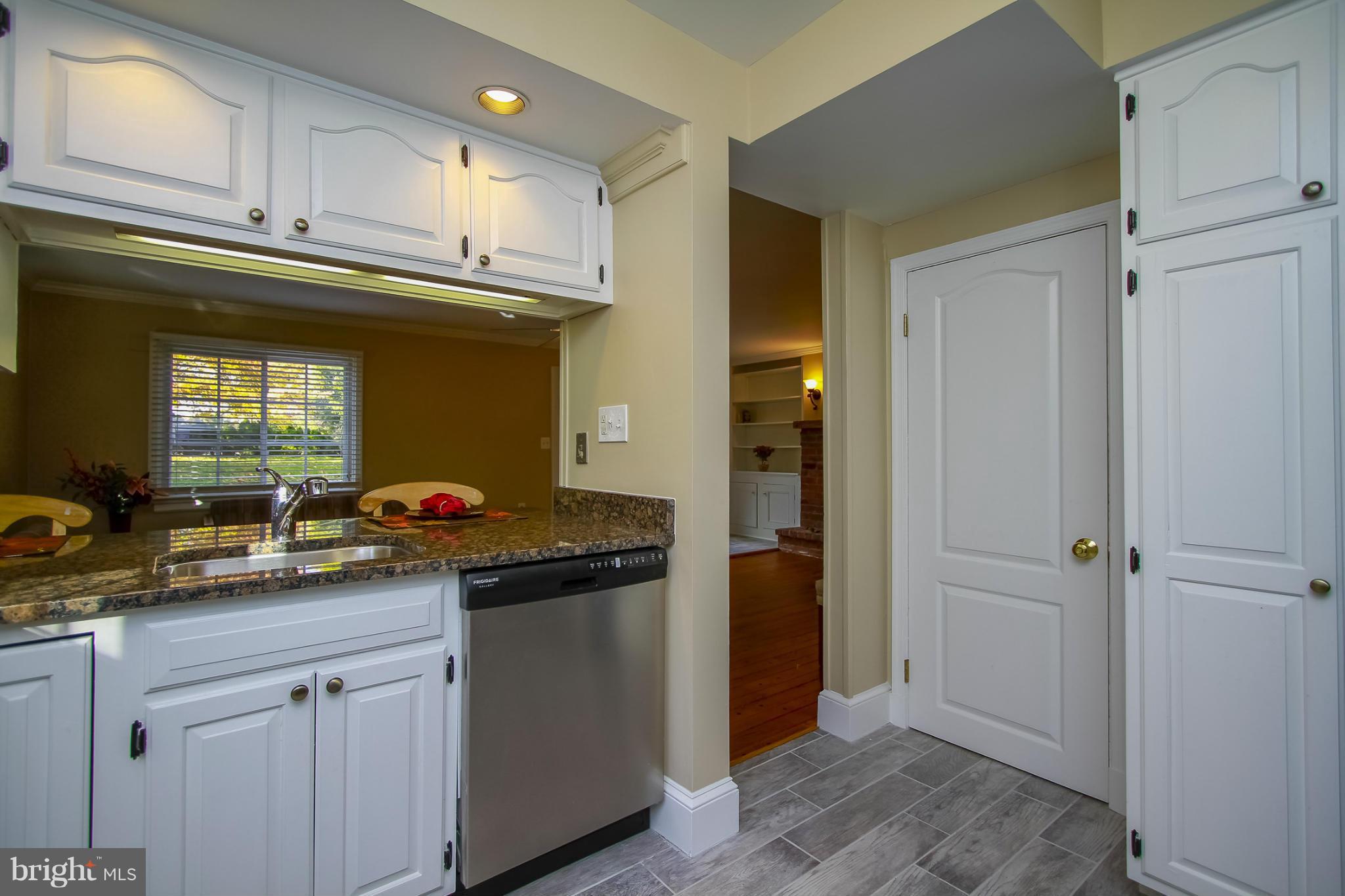 930 Litchfield Road Baltimore, MD 21239 - Photo 12 of 24 a kitchen with a sink and cabinets