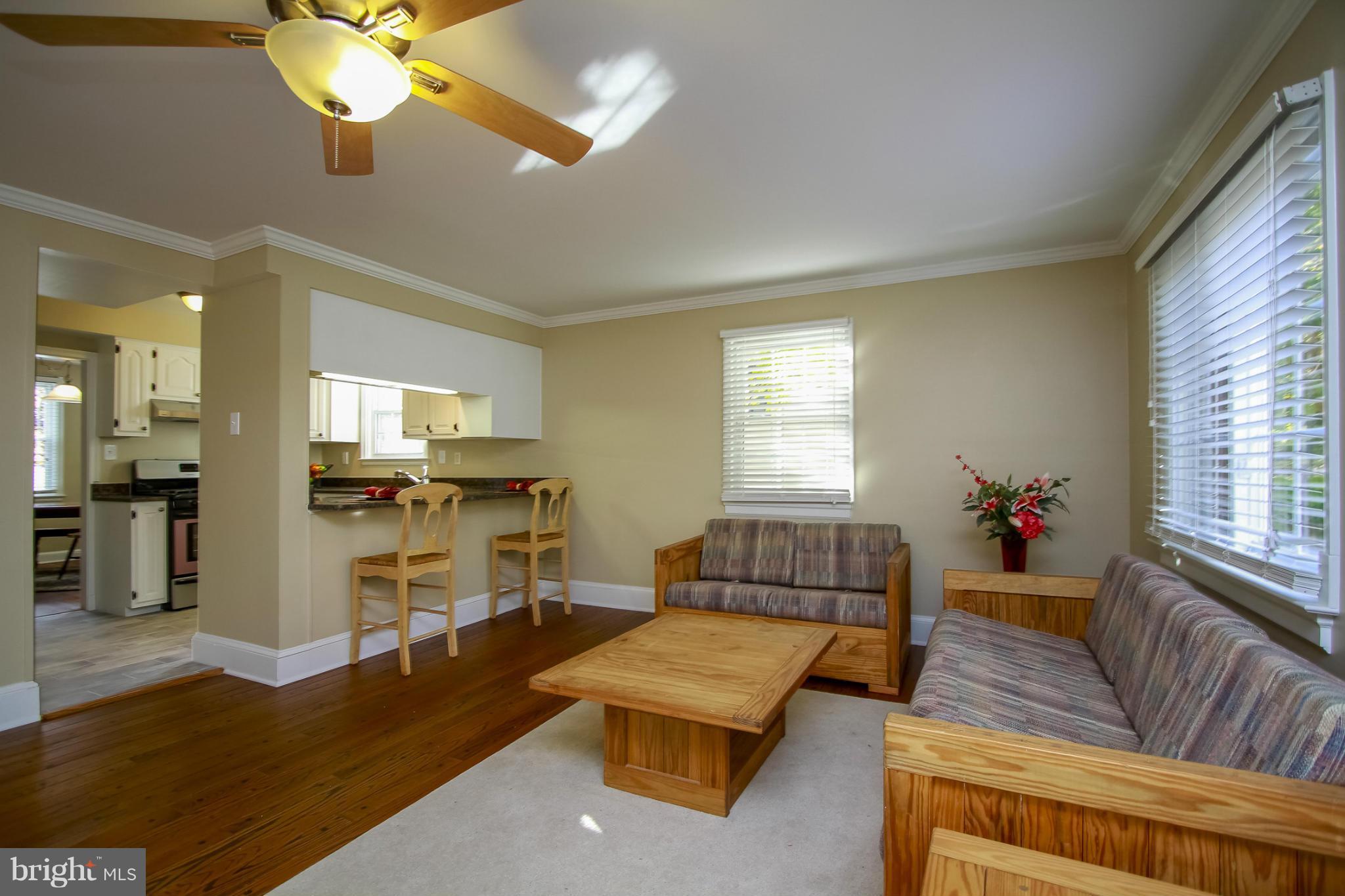 930 Litchfield Road Baltimore, MD 21239 - Photo 7 of 24 a living room with furniture and a window