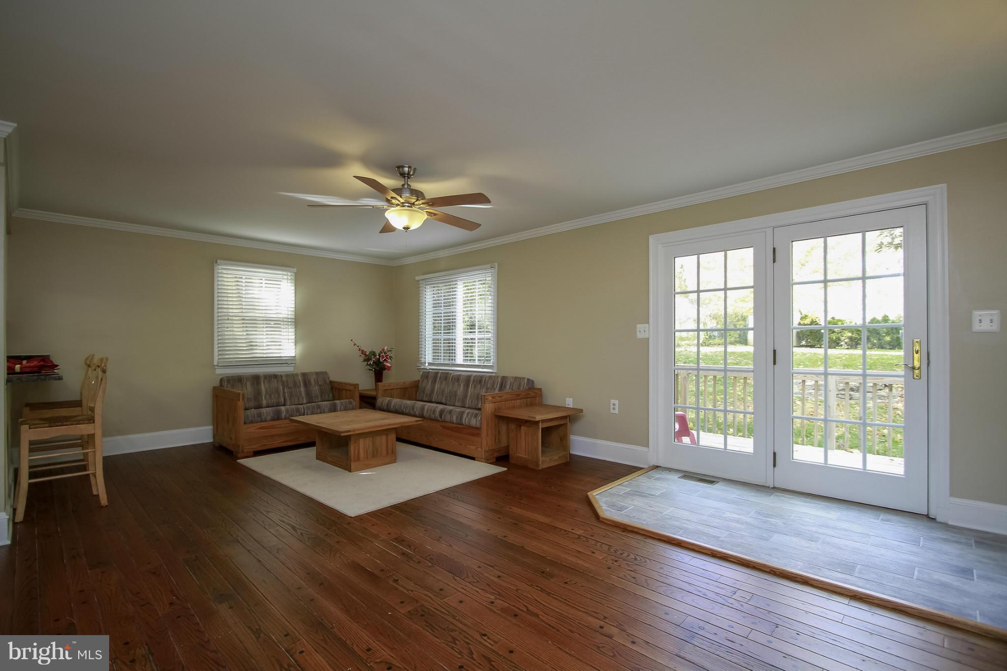 930 Litchfield Road Baltimore, MD 21239 - Photo 8 of 24 a living room with furniture and a window