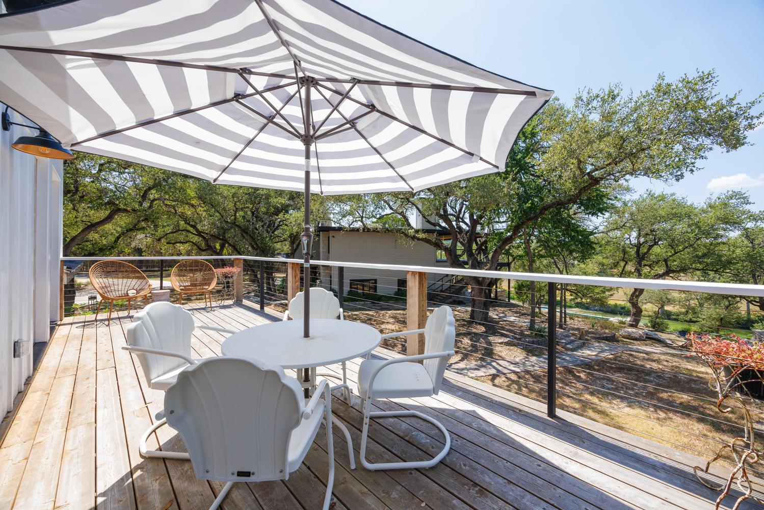 710 Flite Acres Road Wimberley, TX 78676 - Photo 37 of 40 Newly added deck with views of the river from guest quarters