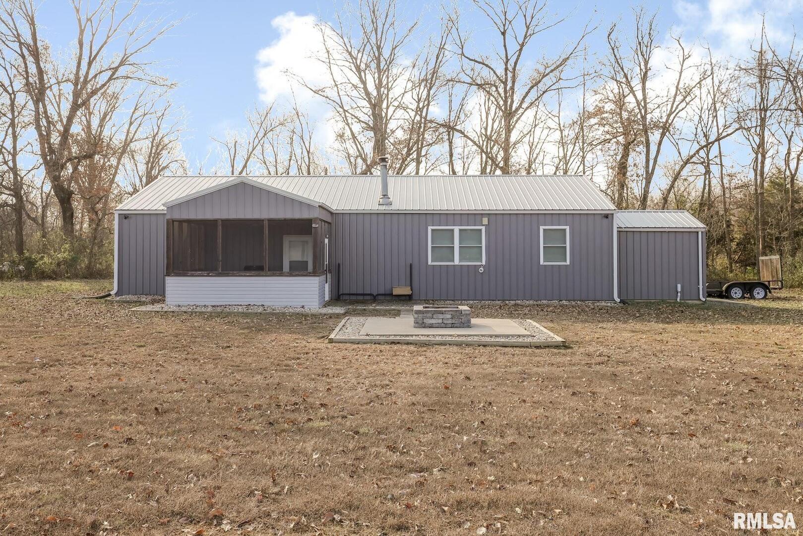 0 Bolen Store Road Thompsonville, IL 62890 - Photo 4 of 52 a backyard of a house