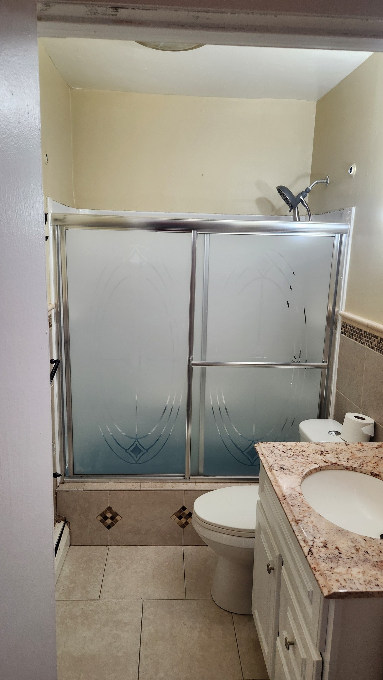 61 Wilson Street New Haven, CT 06519 - Photo 9 of 12 a bathroom with a granite countertop sink a toilet and shower