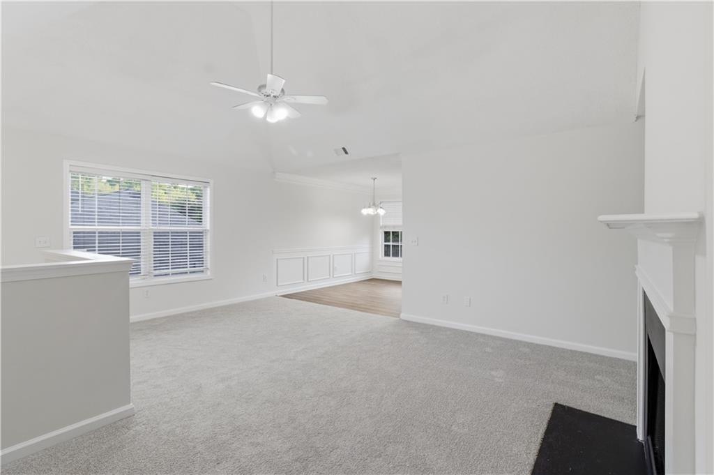 11657 Flemming Court Hampton, GA 30228 - Photo 16 of 30 a view of a livingroom with a ceiling fan and window