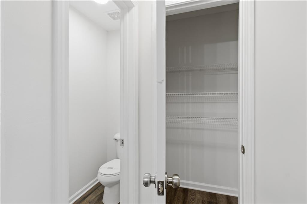11657 Flemming Court Hampton, GA 30228 - Photo 21 of 30 a bathroom with a toilet