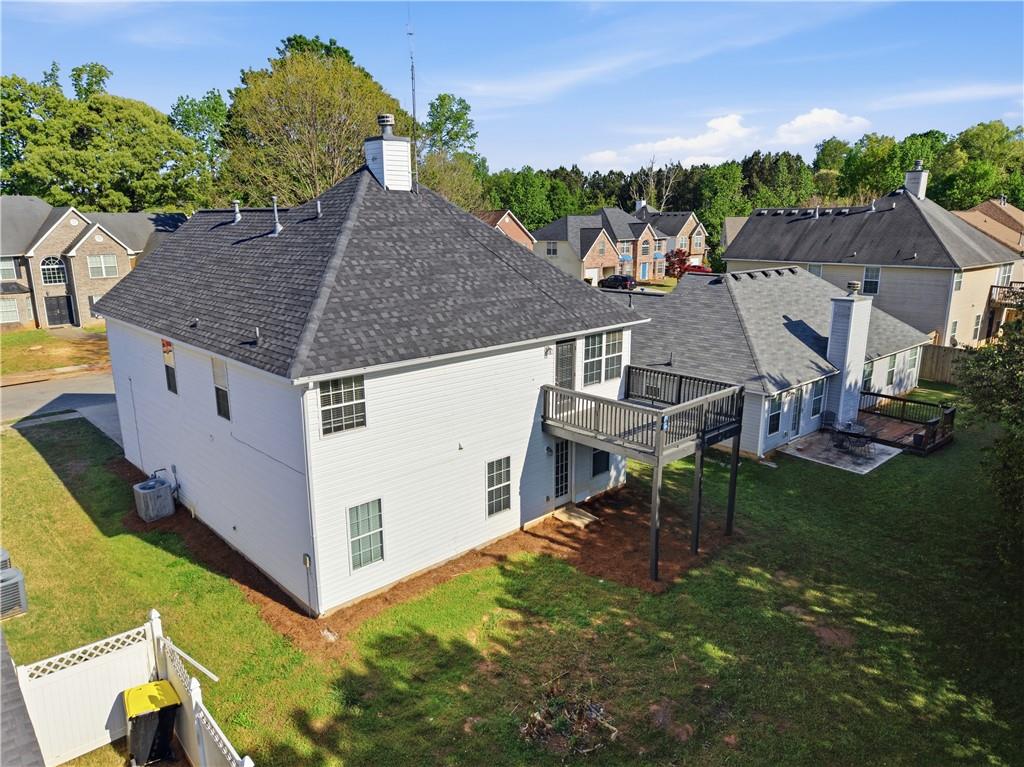 11657 Flemming Court Hampton, GA 30228 - Photo 25 of 30 an aerial view of a house with swimming pool garden and patio
