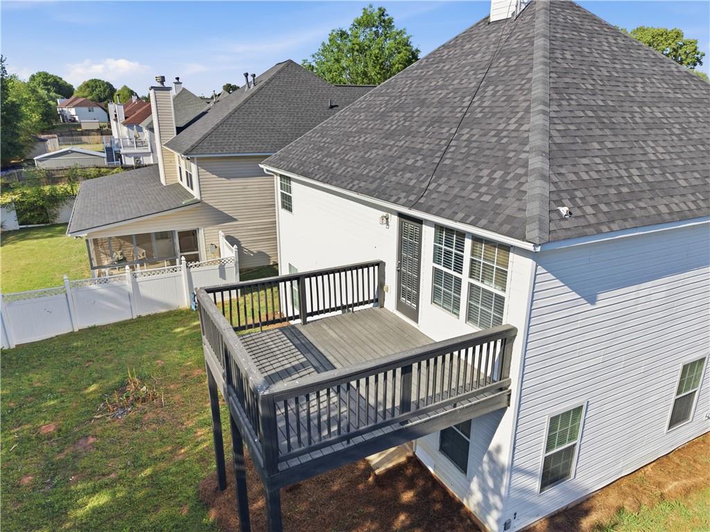 11657 Flemming Court Hampton, GA 30228 - Photo 27 of 30 a balcony with table and chairs
