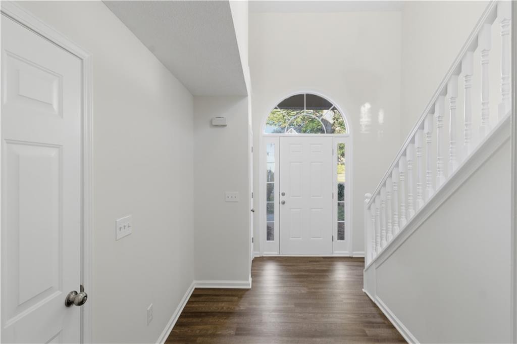 11657 Flemming Court Hampton, GA 30228 - Photo 3 of 30 a view of an entryway with wooden floor