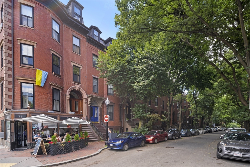 55 East Springfield Street, Unit 2 Boston, MA 02118 - Photo 13 of 22 a city street lined with buildings and cars