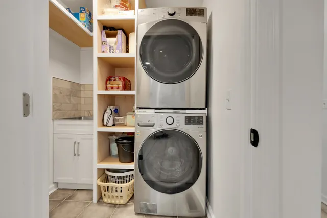 a utility room with dryer and washer