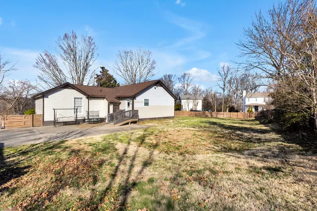 a view of a house with snow on the background