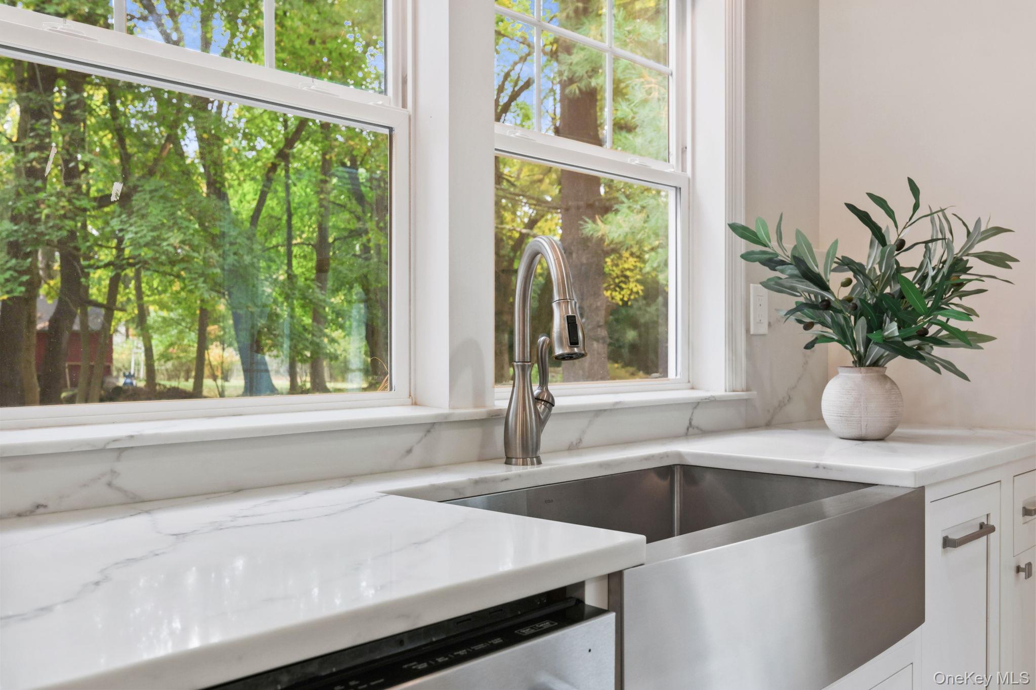 790 Hardscrabble Road Chappaqua, NY 10514 - Photo 17 of 43 a kitchen with a sink and a large window