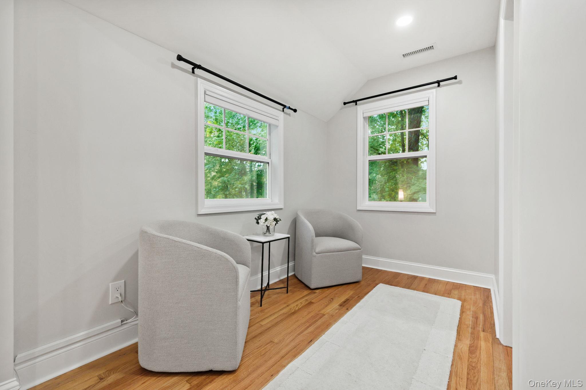 790 Hardscrabble Road Chappaqua, NY 10514 - Photo 28 of 43 a living room with furniture and a window