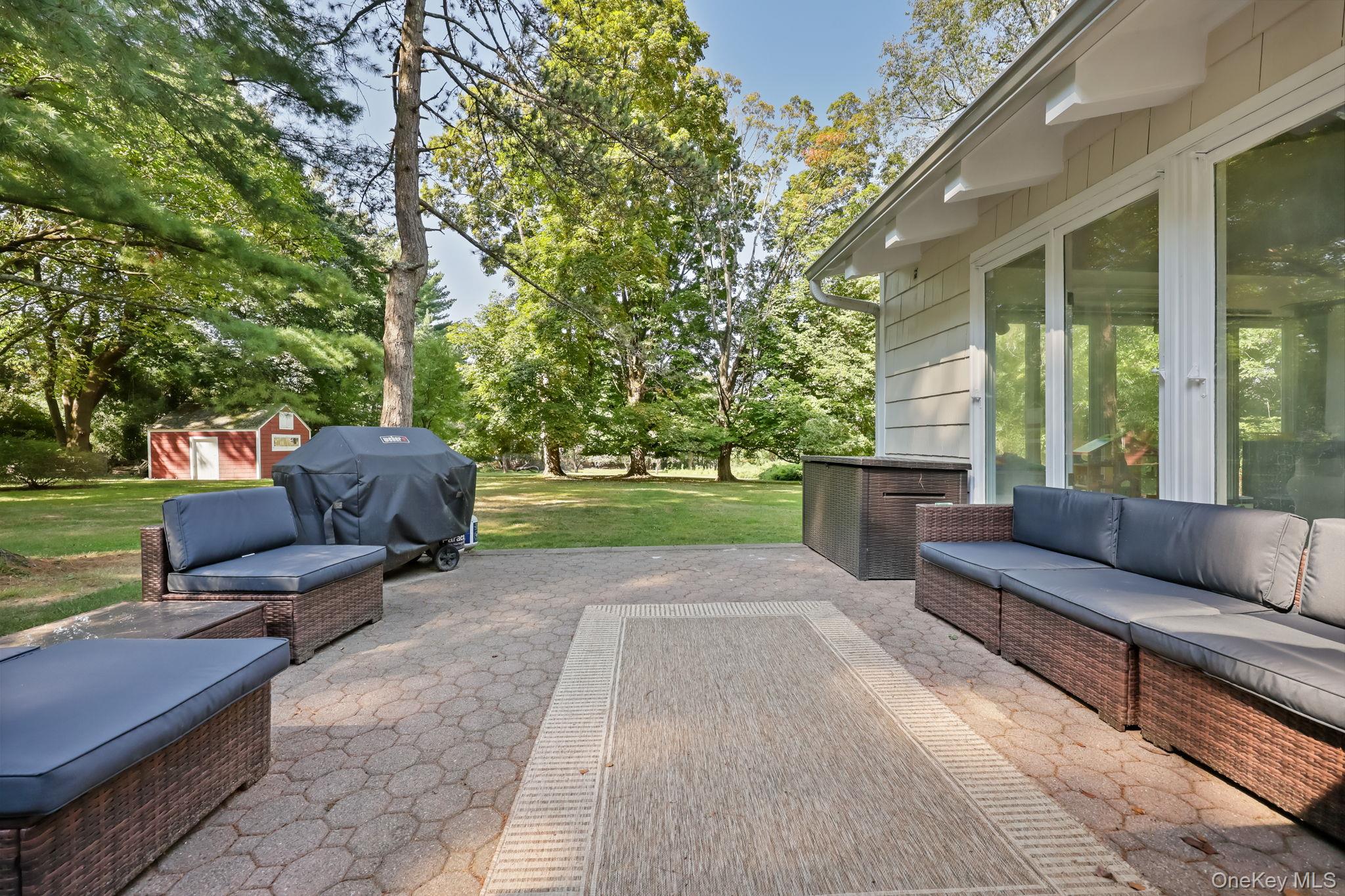 790 Hardscrabble Road Chappaqua, NY 10514 - Photo 39 of 43 a view of backyard with outdoor seating and green space